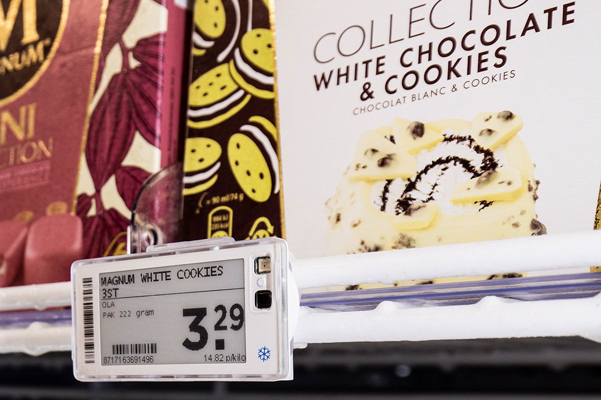 Electronic shelf label for Magnum ice cream in a grocery store freezer aisle.