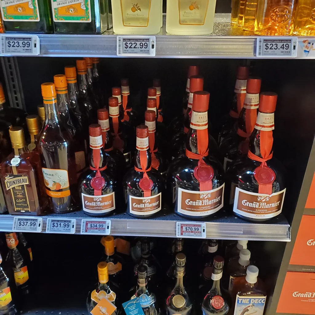 Retail shelf with packaged food products and electronic price labels in supermarket aisle